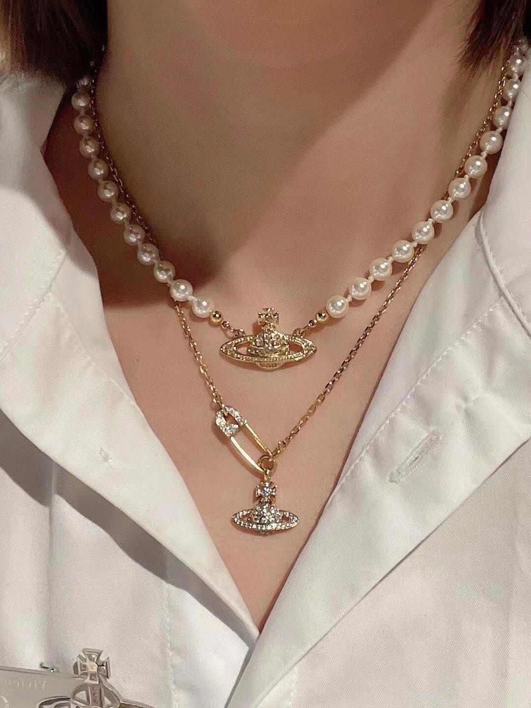 Martin Graham pendant necklace in polished metal-tone – detail view