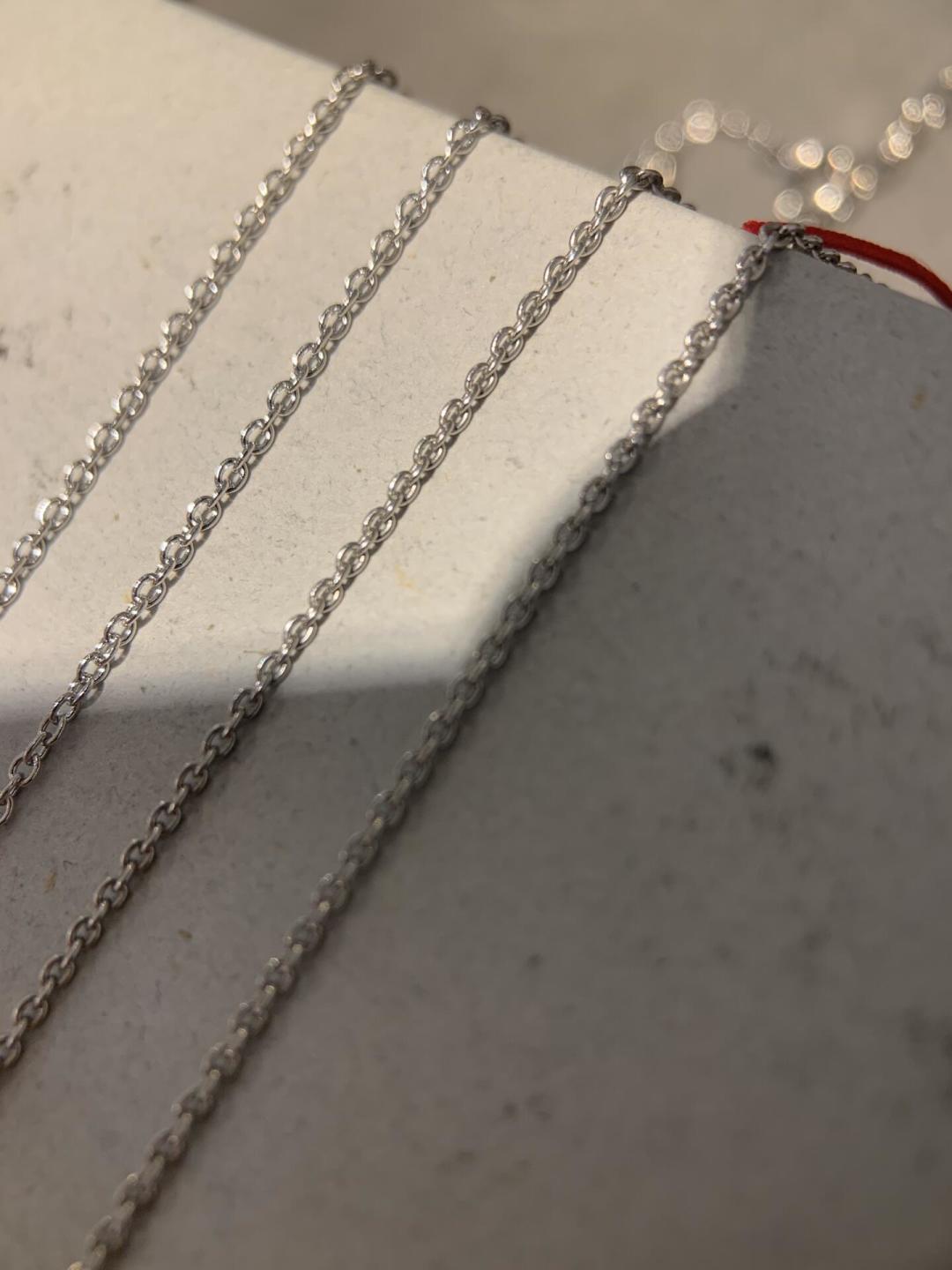 Martin Graham jewelry accessory in polished metal-tone – detail view