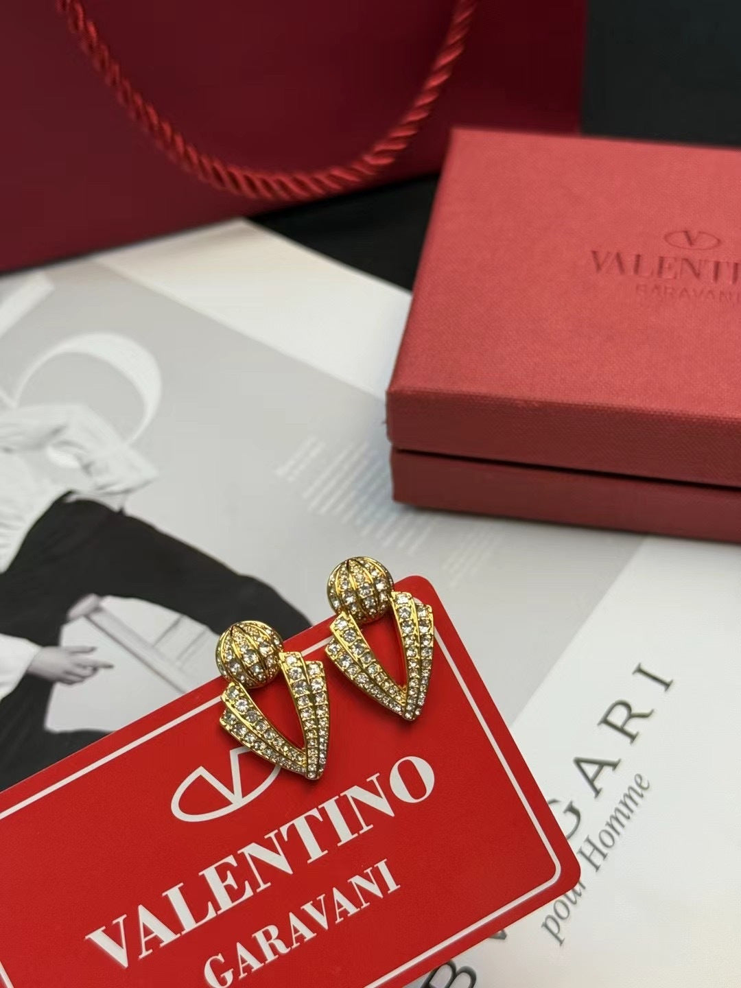 Martin Graham stud earrings in polished metal-tone – detail view