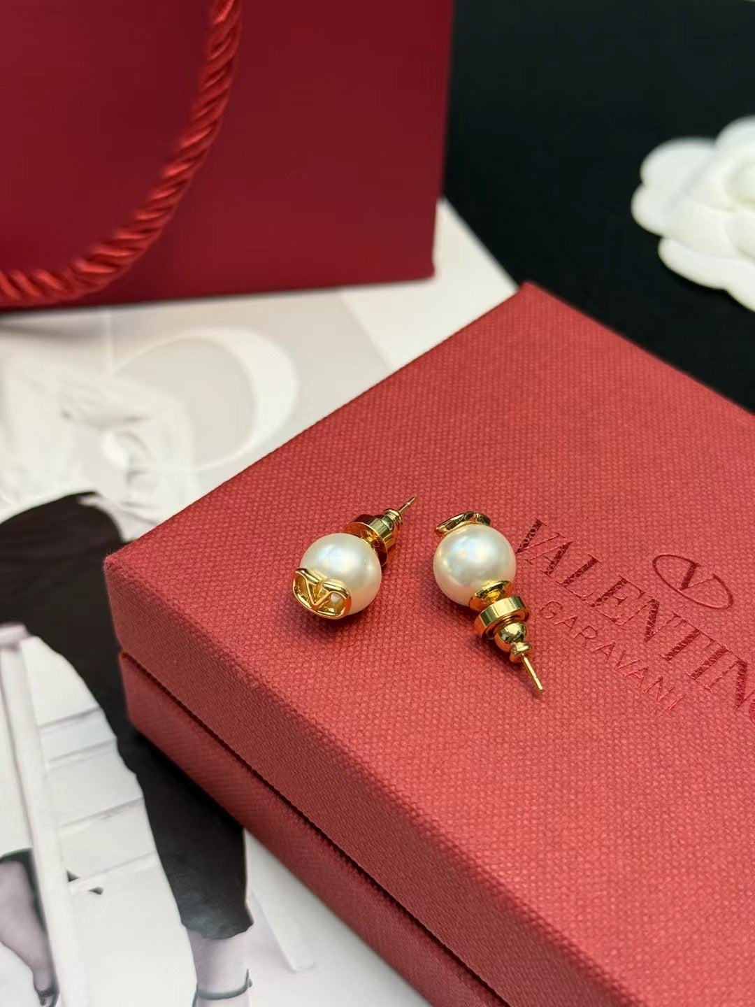 Martin Graham stud earrings in polished metal-tone