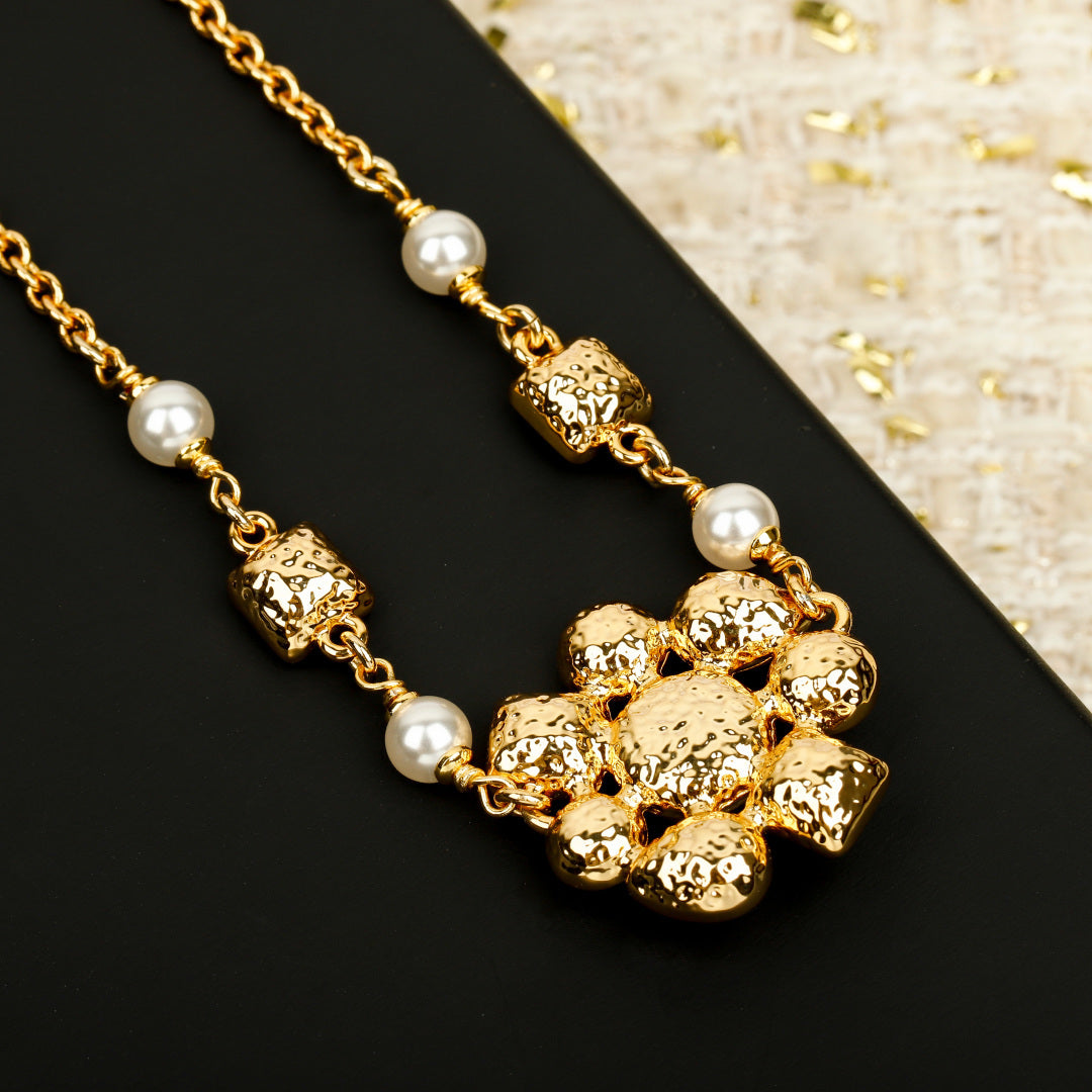 Martin Graham pendant necklace in polished metal-tone – side detail