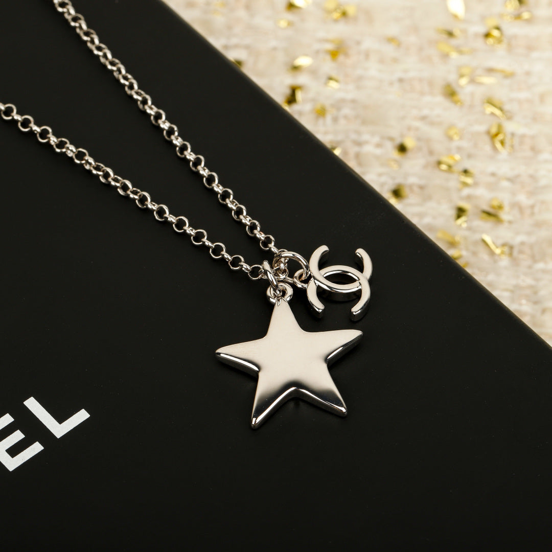 Martin Graham pendant necklace in polished metal-tone – detail view