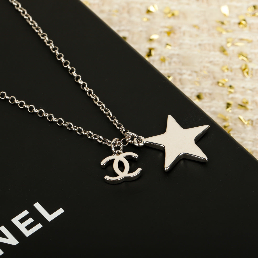 Martin Graham pendant necklace in polished metal-tone – side detail