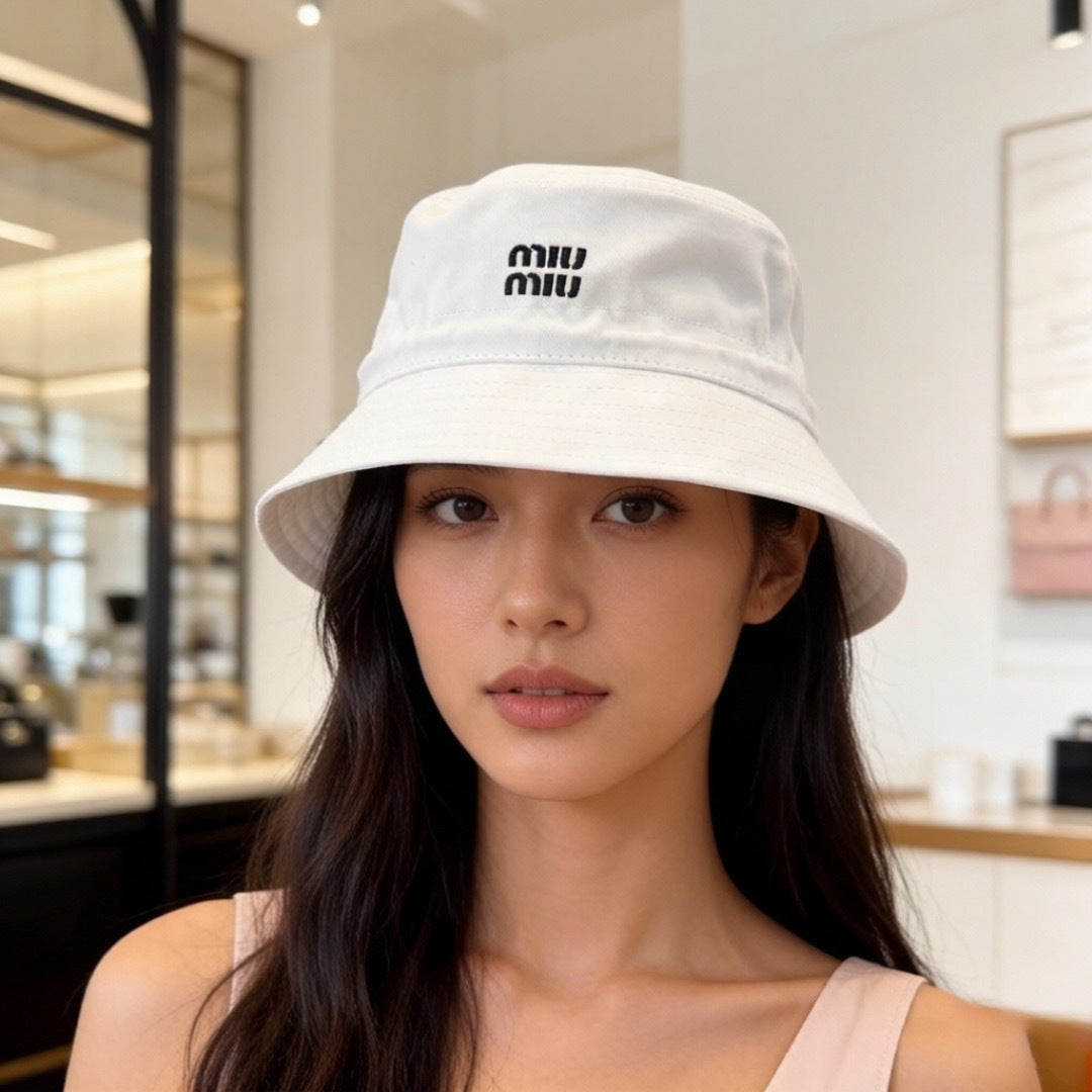 Miu Miu Canvas Bucket Hat - image 1
