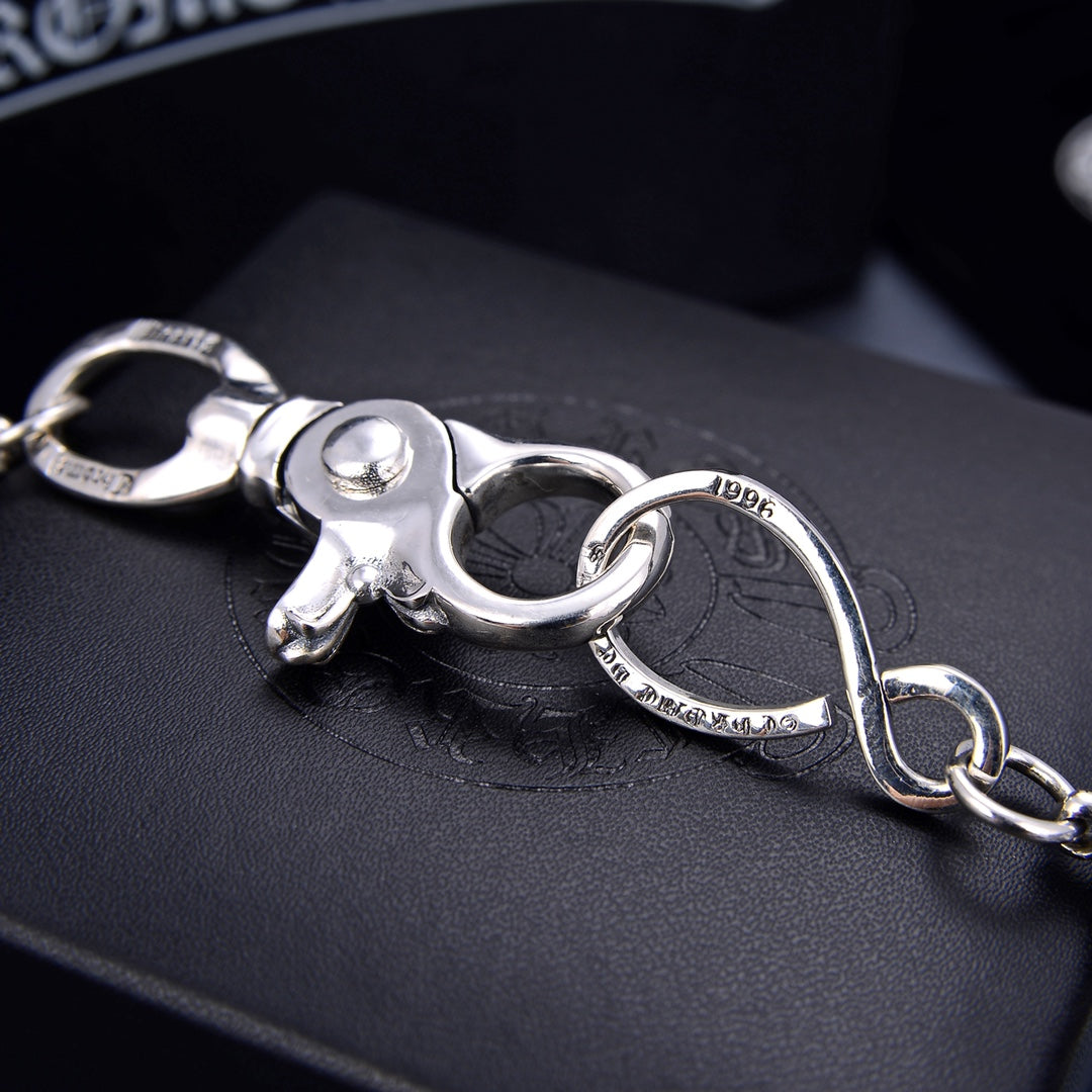 Martin Graham chain accessory in polished metal-tone – side detail