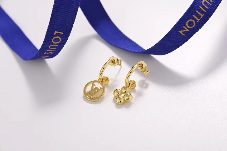 Martin Graham stud earrings in polished metal-tone – front product view