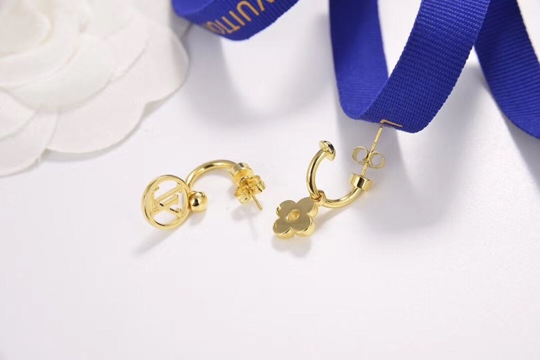 Martin Graham stud earrings in polished metal-tone – styled product view