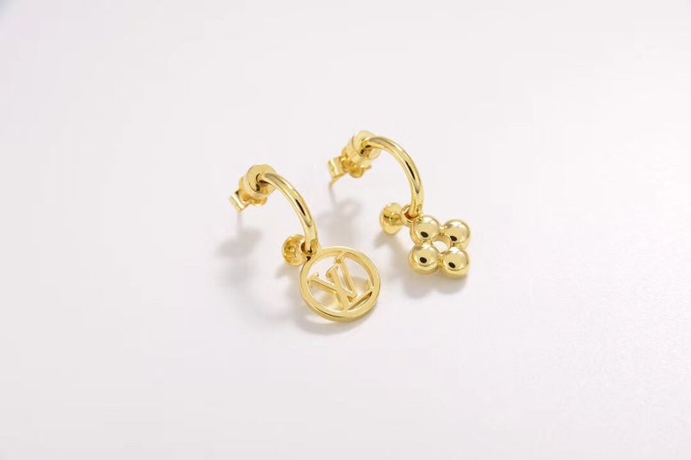 Martin Graham stud earrings in polished metal-tone – detail view