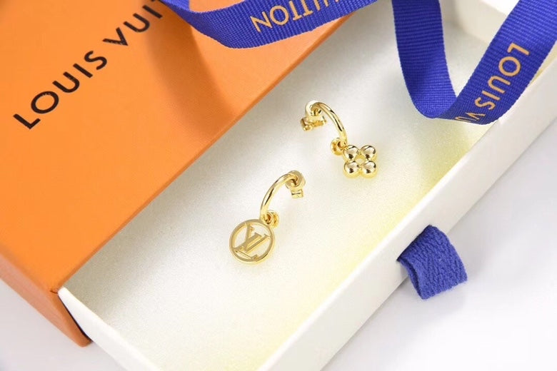 Martin Graham stud earrings in polished metal-tone – detail view
