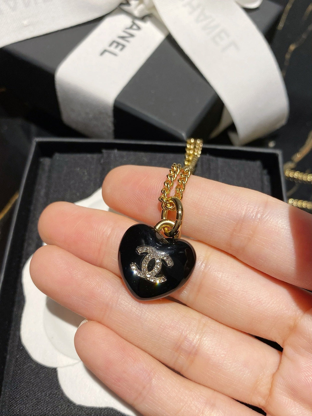 Martin Graham pendant necklace in polished metal-tone – detail view