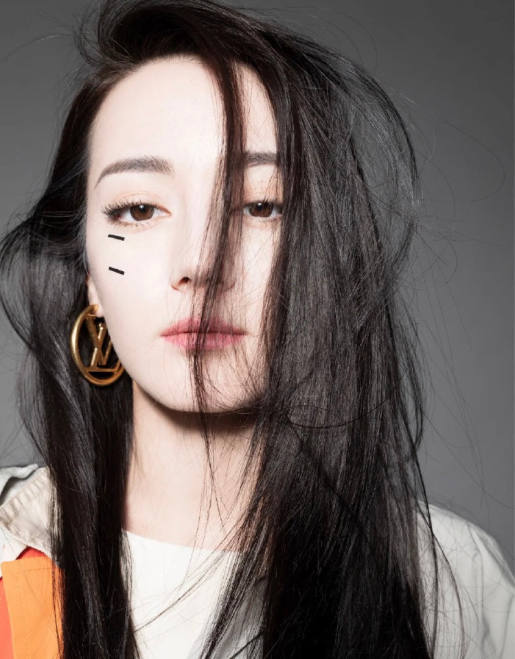 Martin Graham earrings in polished metal-tone – front product view