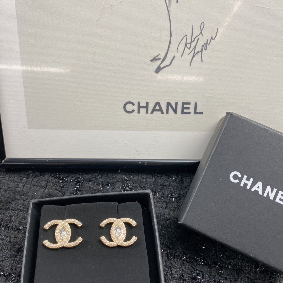 Martin Graham stud earrings in polished metal-tone – main product view