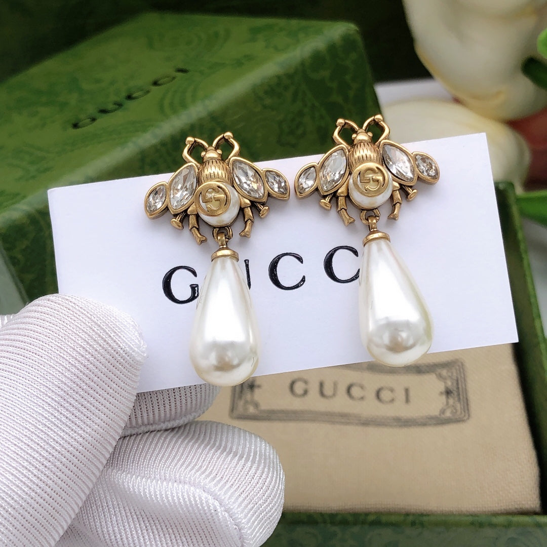 Martin Graham stud earrings in polished metal-tone – main product view