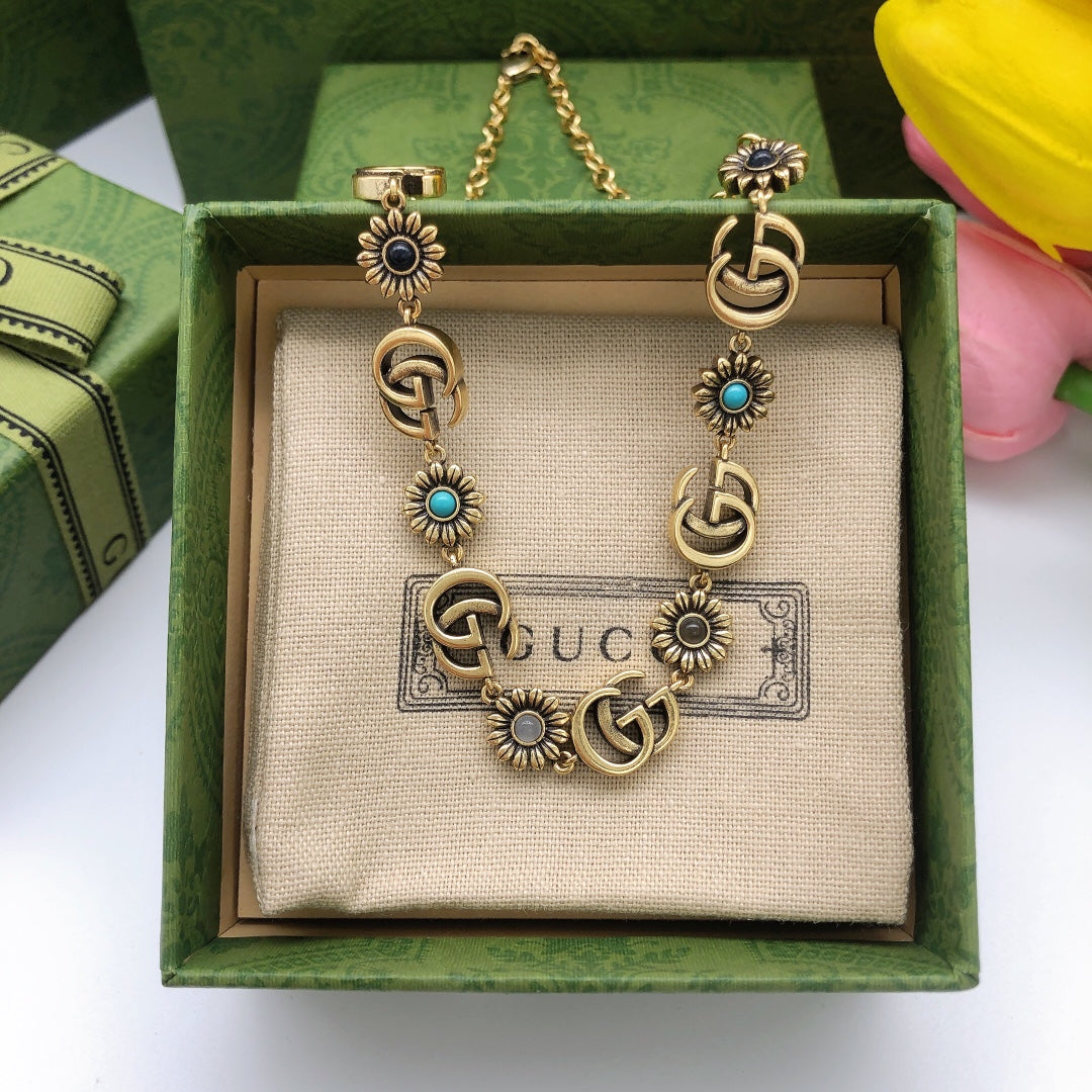 Martin Graham pendant necklace in polished metal-tone – detail view