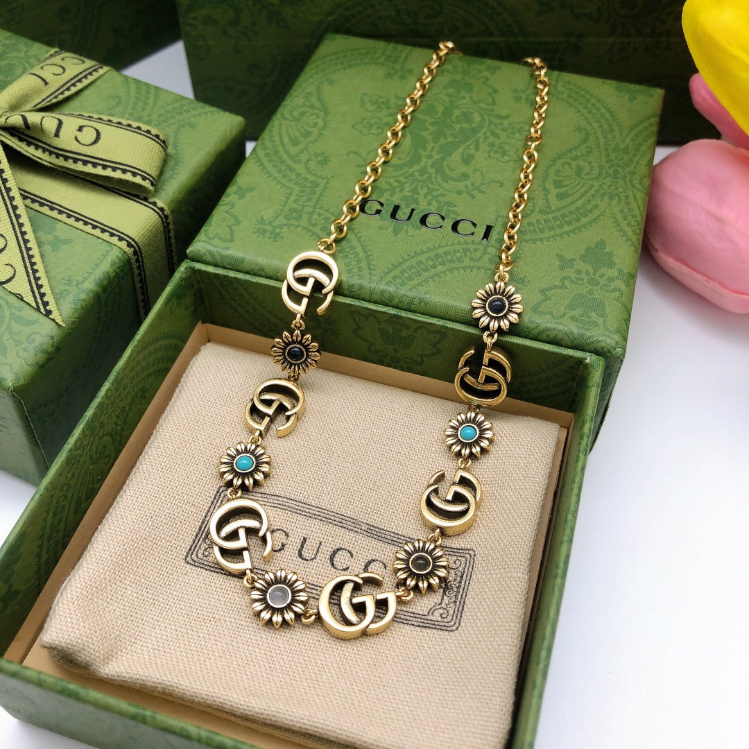 Martin Graham pendant necklace in polished metal-tone – front product view