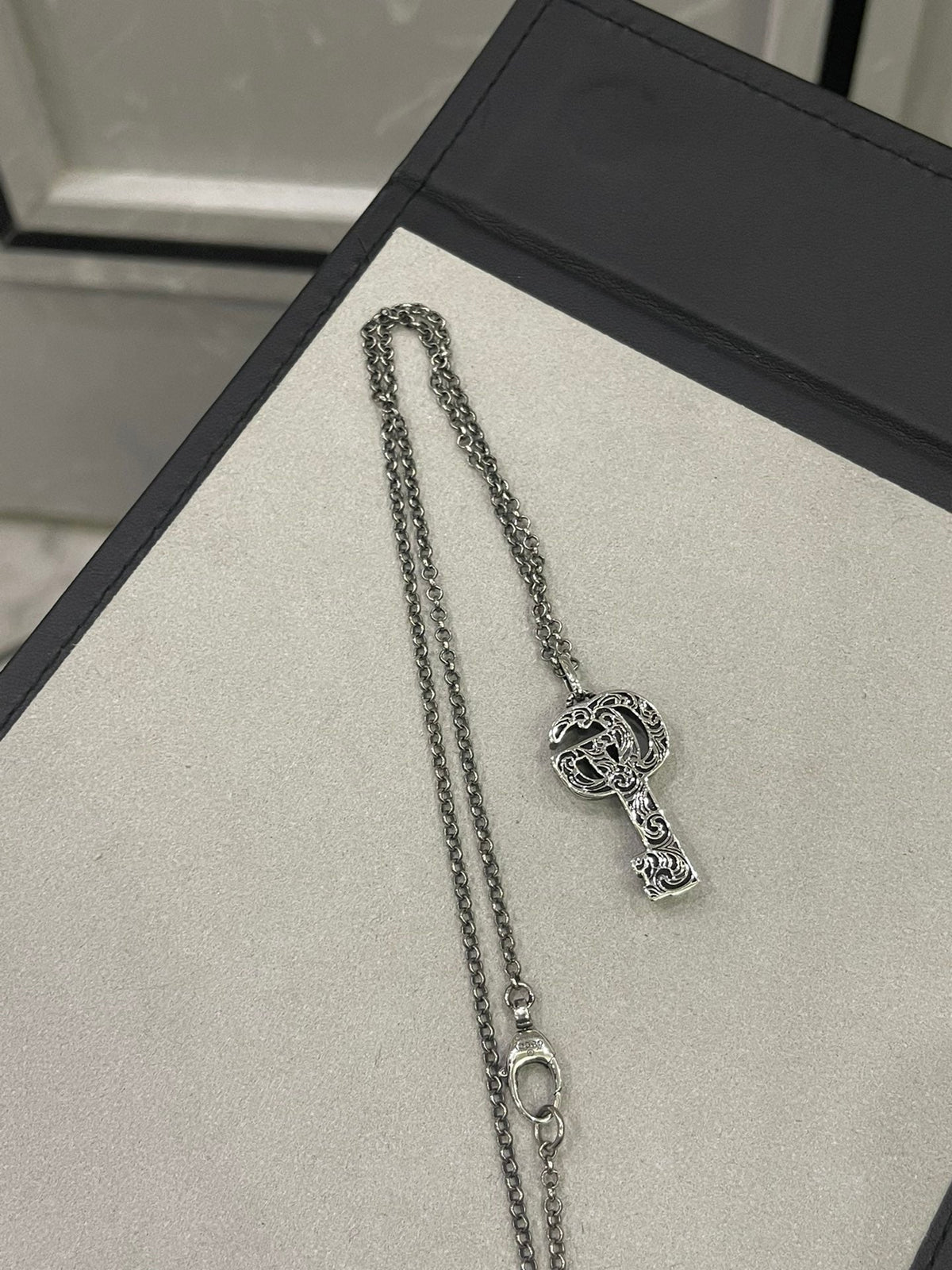 Martin Graham jewelry accessory in polished metal-tone – styled product view