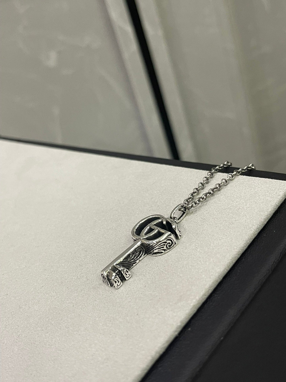 Martin Graham jewelry accessory in polished metal-tone – detail view