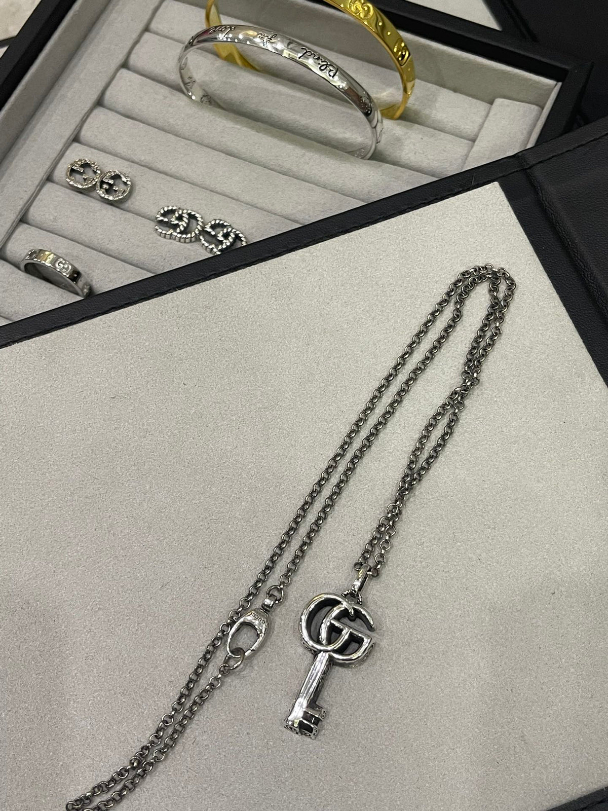 Martin Graham jewelry accessory in polished metal-tone – detail view
