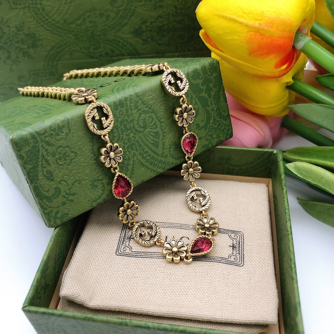 Martin Graham pendant necklace in polished metal-tone – side detail