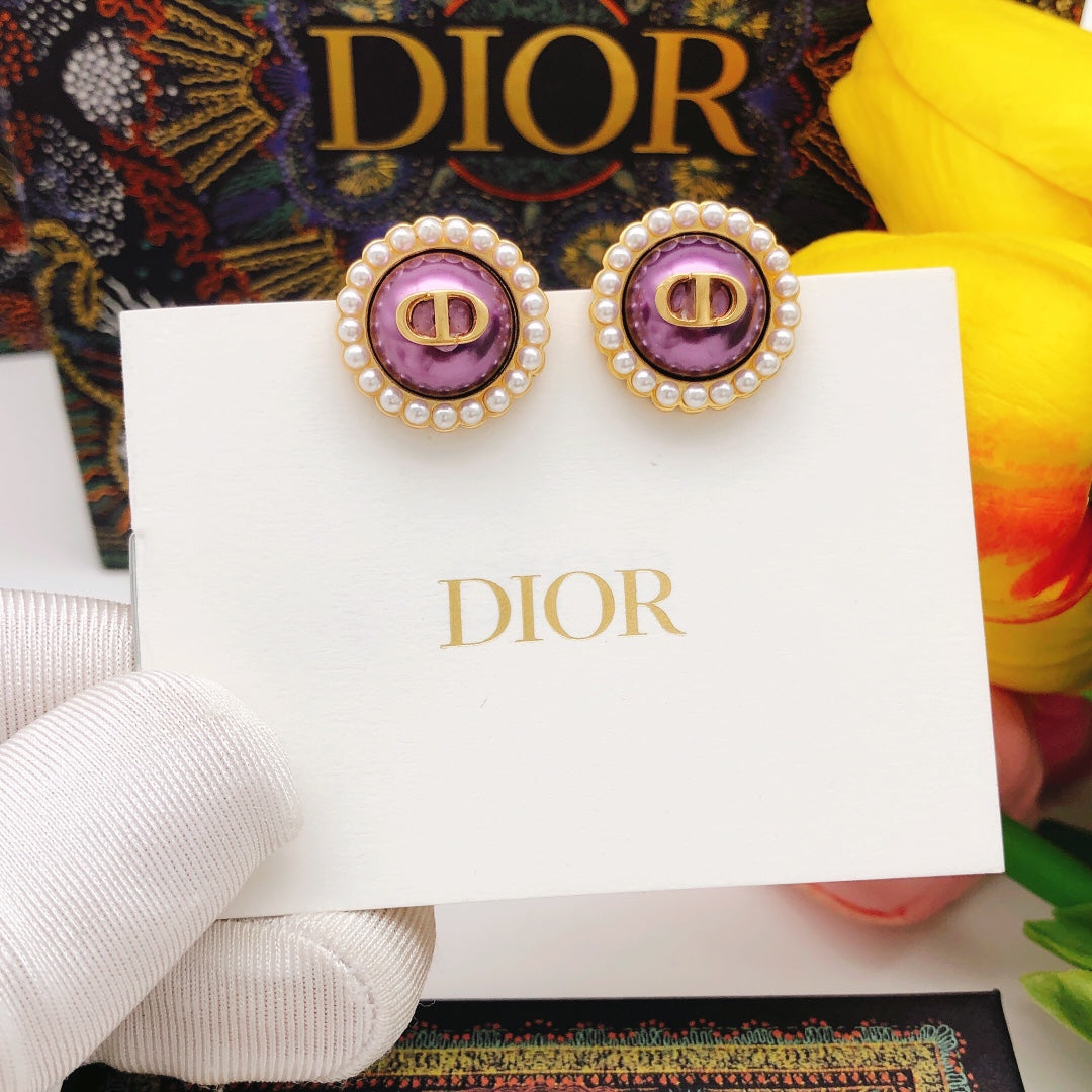 Martin Graham stud earrings in polished metal-tone – front view