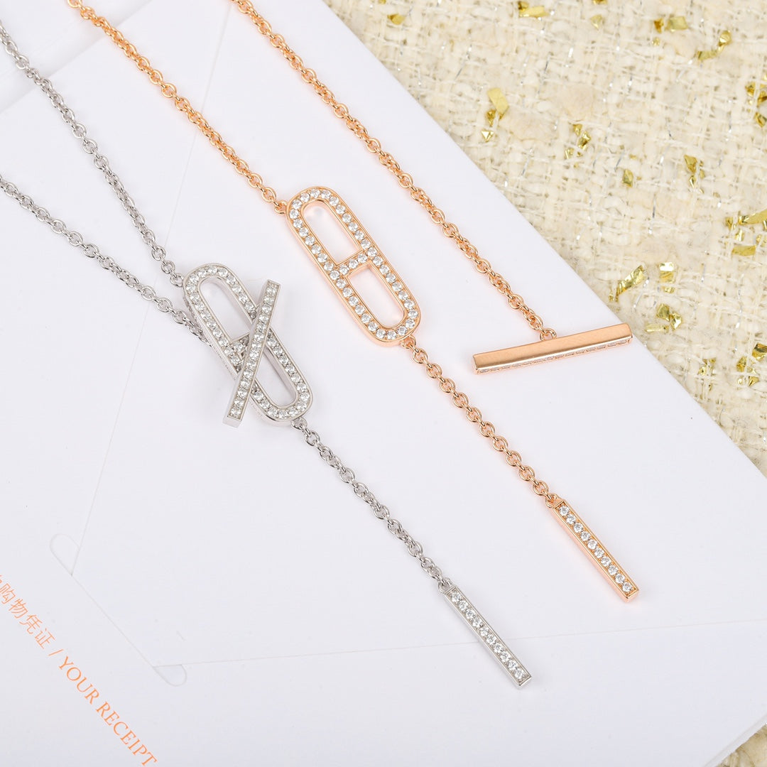 Martin Graham pendant necklace in polished metal-tone – side detail