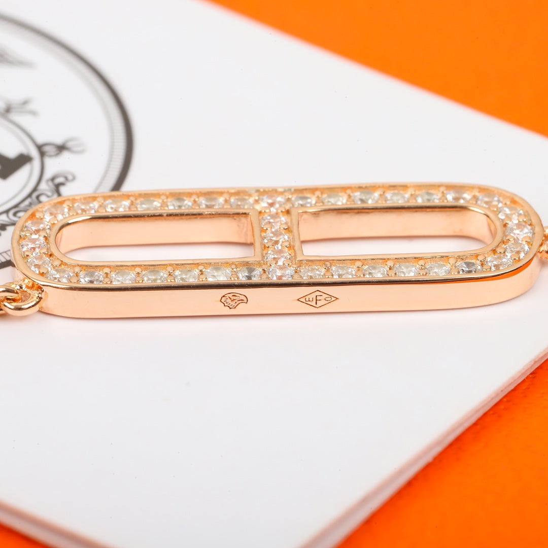 Martin Graham pendant necklace in polished metal-tone – front product view