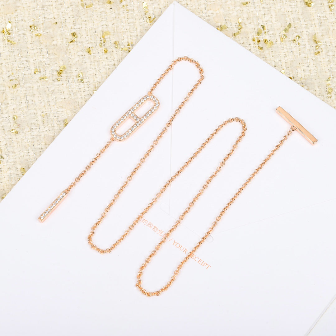 Martin Graham pendant necklace in polished metal-tone – detail view