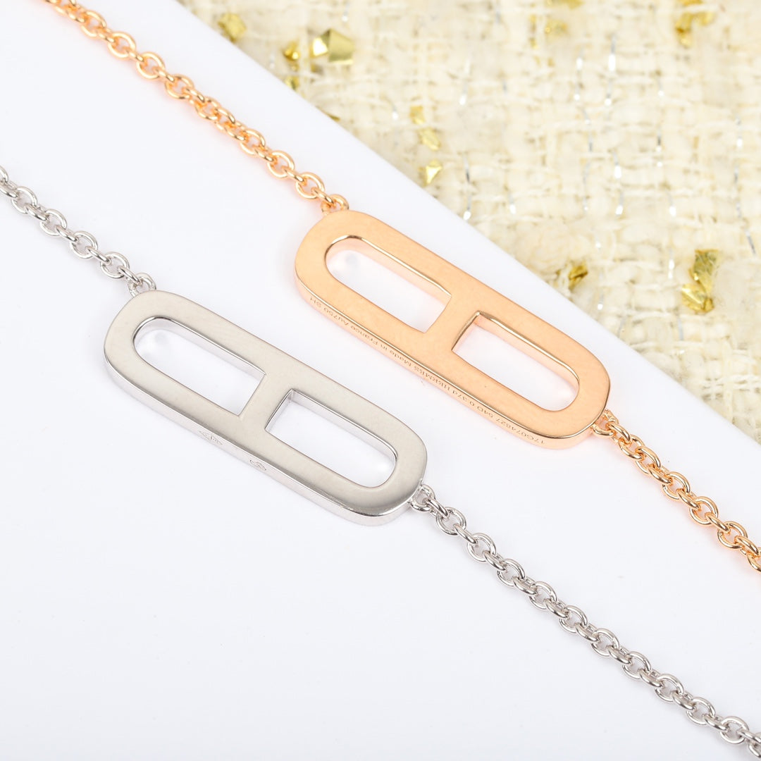 Martin Graham pendant necklace in polished metal-tone – styled product view