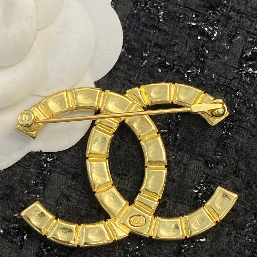 Martin Graham brooch in polished metal-tone – styled product view