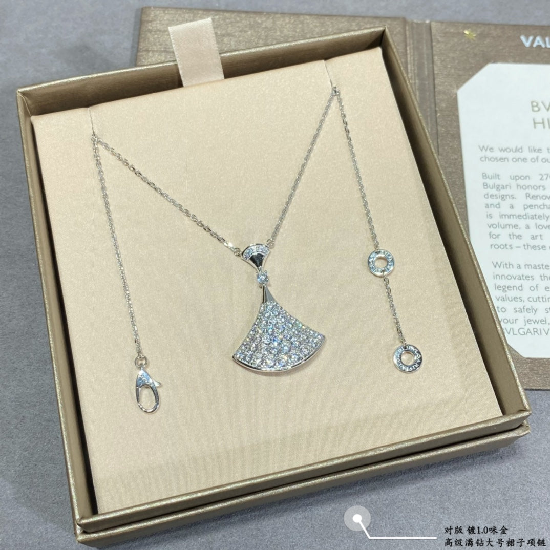 Martin Graham pendant necklace in polished metal-tone – side detail
