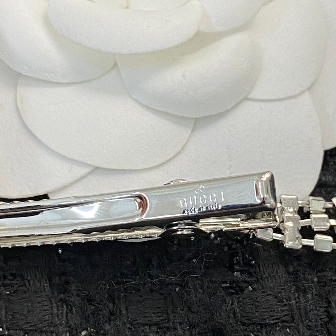 Martin Graham hair accessory in polished metal-tone – detail view