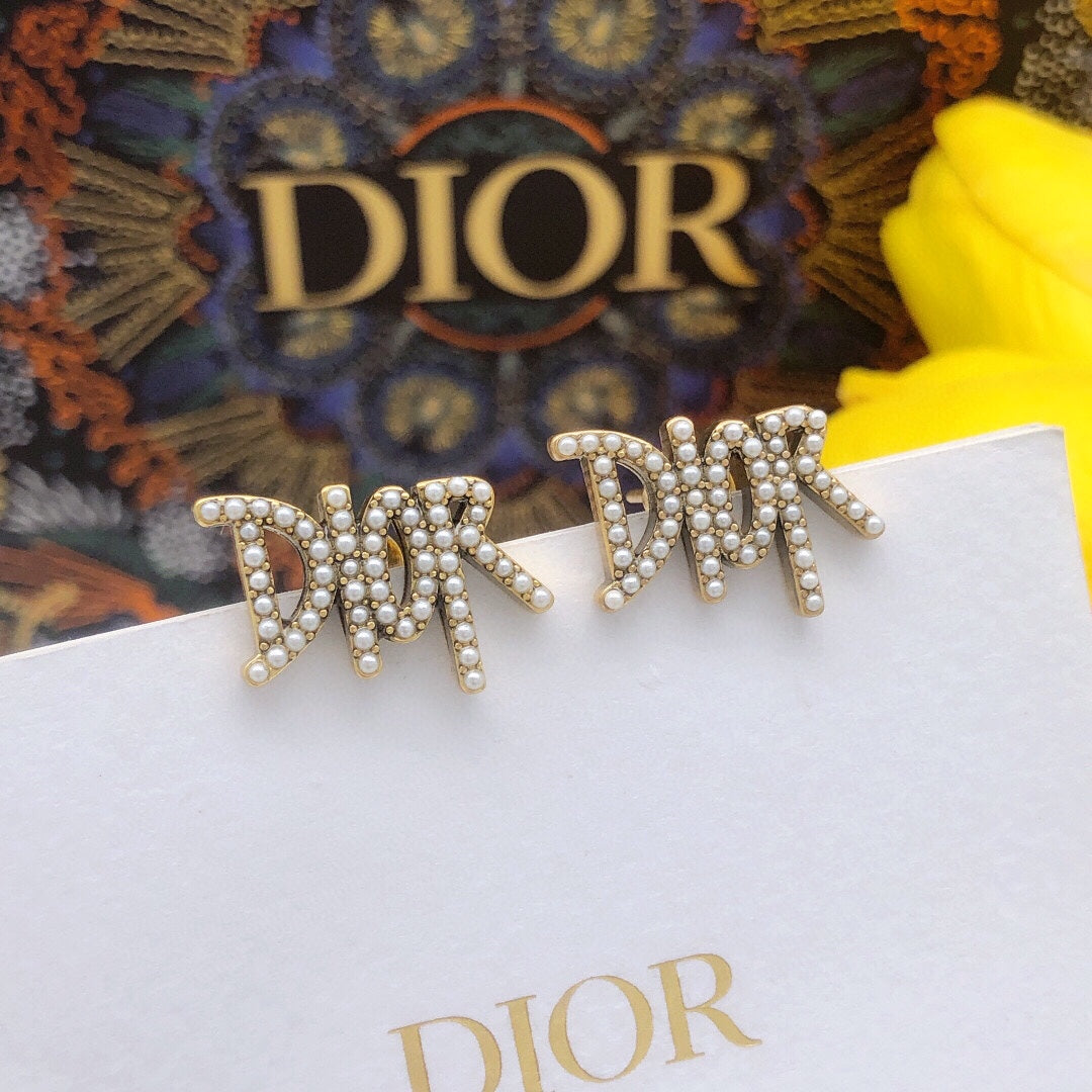 Martin Graham stud earrings in polished metal-tone – main product view