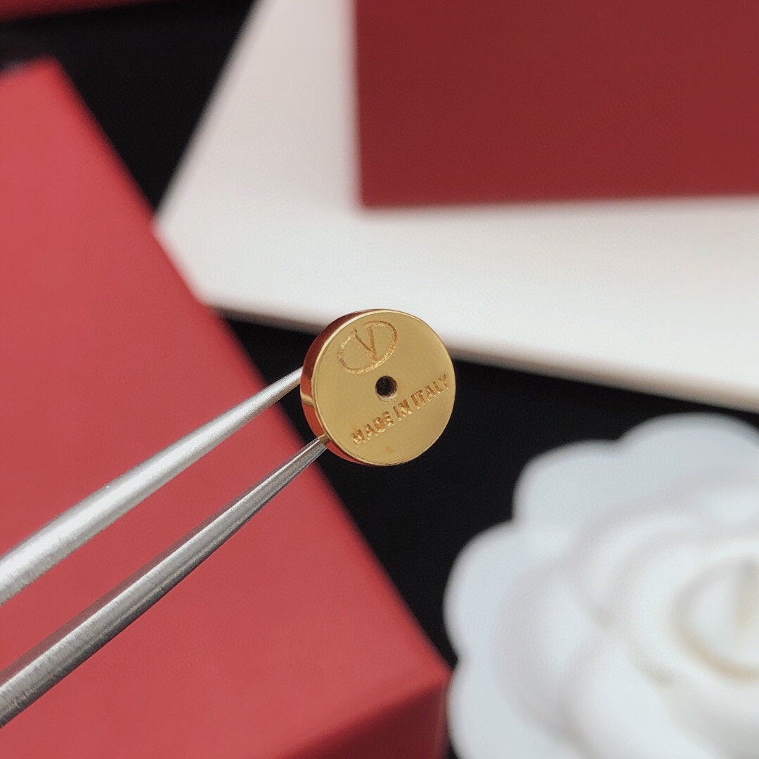 Martin Graham stud earrings in polished metal-tone – main product view