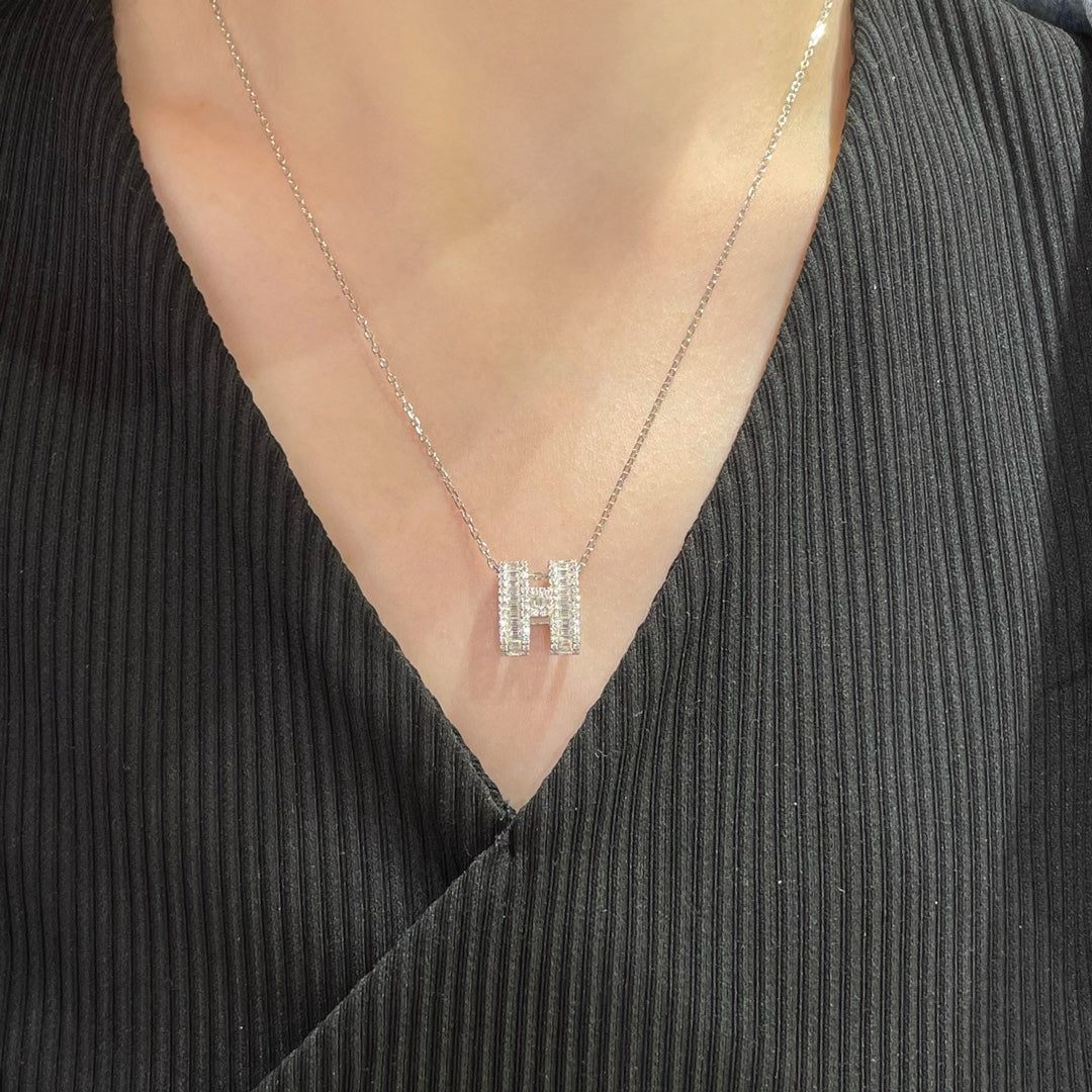 Martin Graham pendant necklace in polished metal-tone – front product view