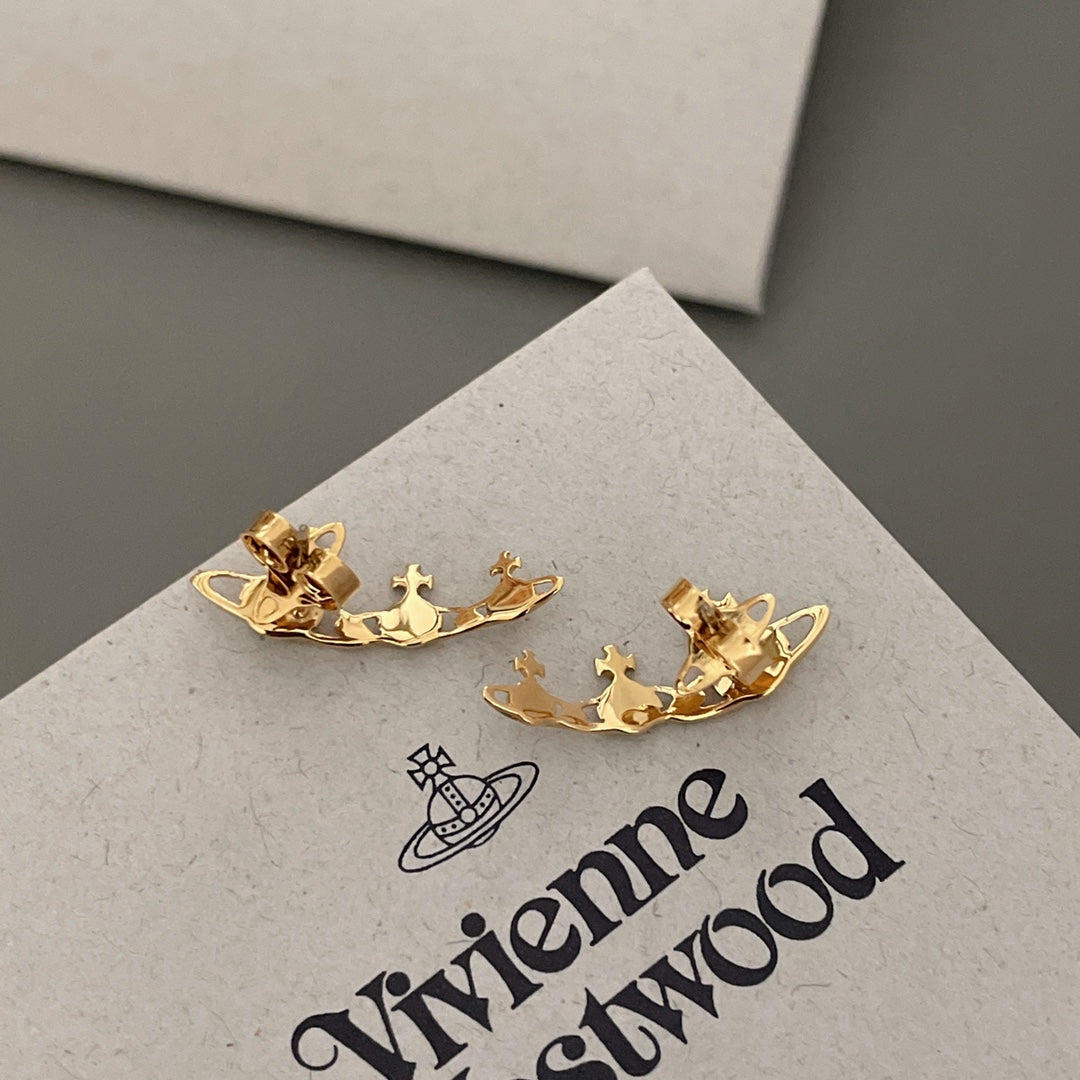 Martin Graham stud earrings in polished metal-tone – close-up detail