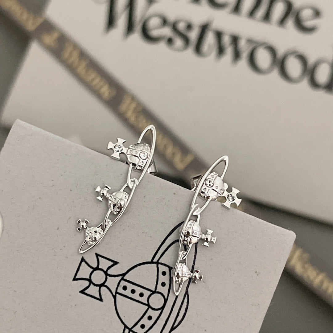 Martin Graham stud earrings in polished metal-tone – front product view