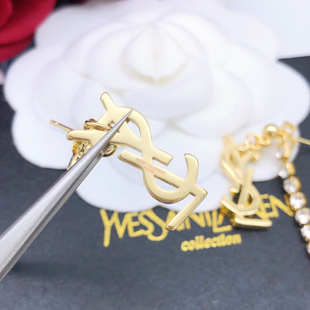 Martin Graham stud earrings in polished metal-tone – styled product view
