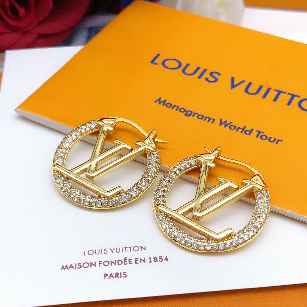 Martin Graham earrings in polished metal-tone – front product view