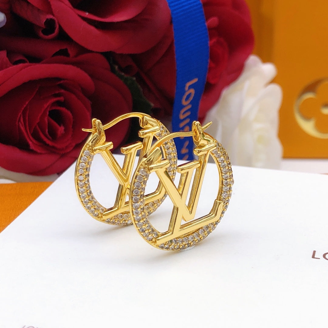 Martin Graham earrings in polished metal-tone – styled product view