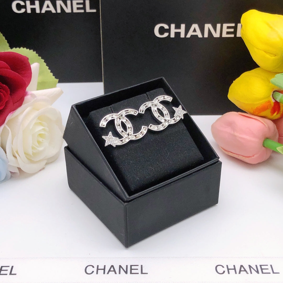 Martin Graham stud earrings in polished metal-tone – main product view