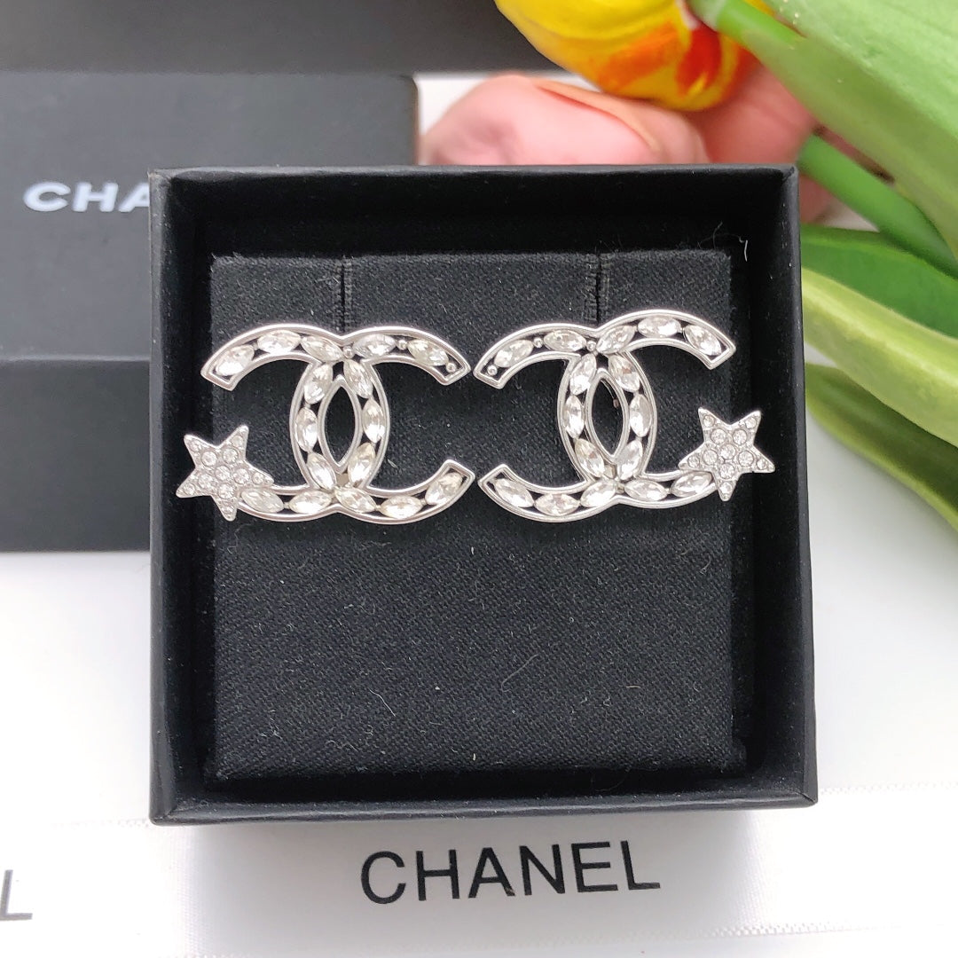 Martin Graham stud earrings in polished metal-tone – front product view
