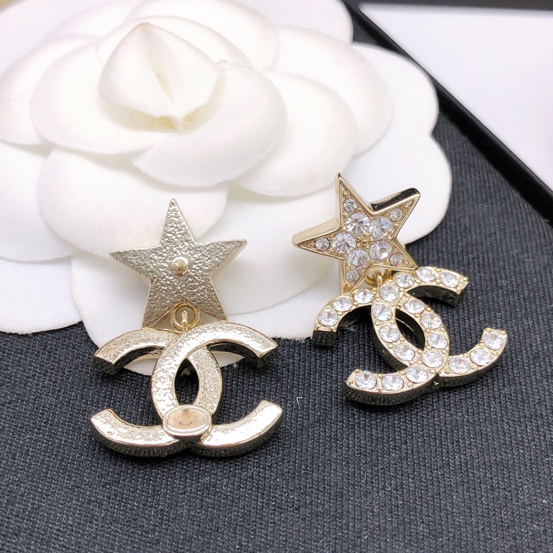 Martin Graham stud earrings in polished metal-tone – styled product view