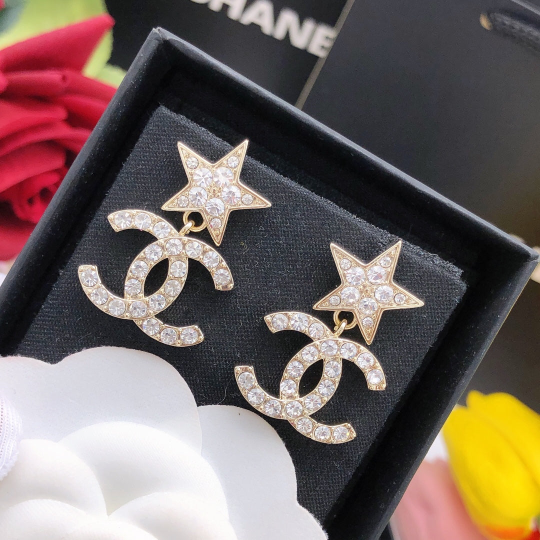 Martin Graham stud earrings in polished metal-tone – front product view