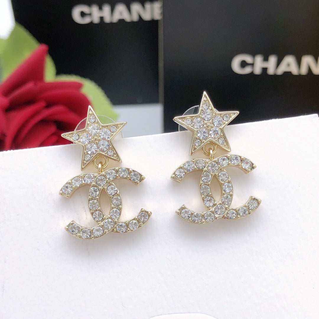 Martin Graham stud earrings in polished metal-tone – detail view