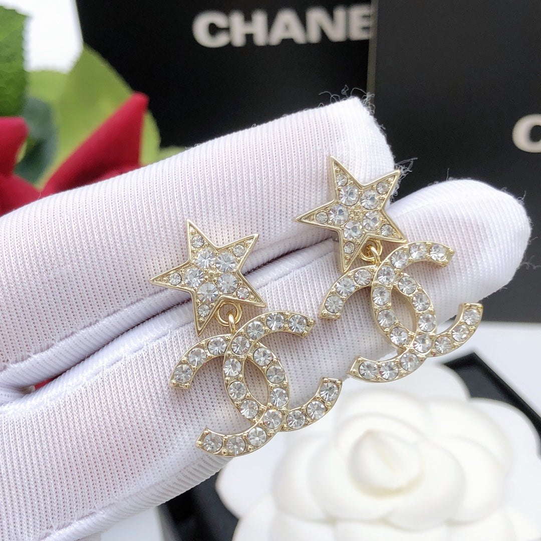 Martin Graham stud earrings in polished metal-tone – front product view