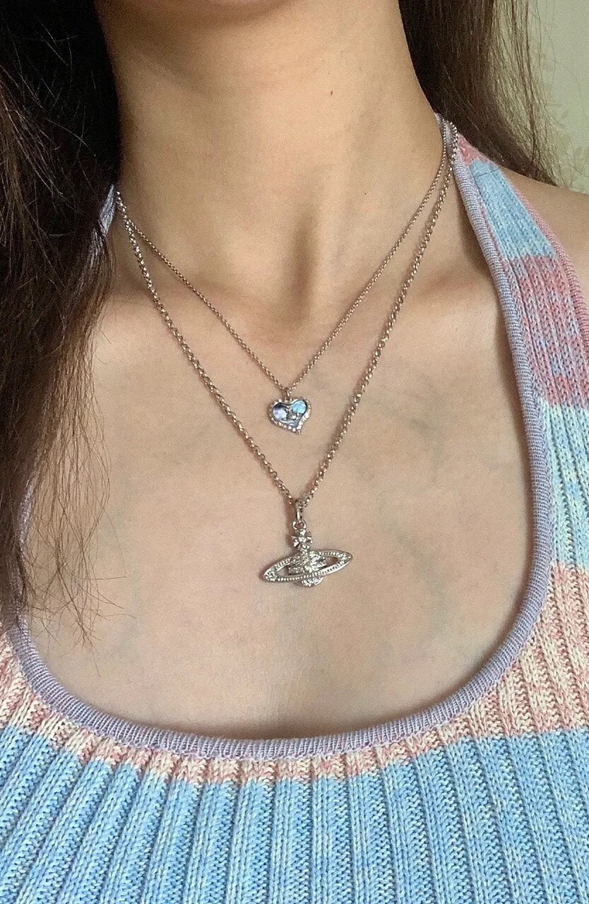Martin Graham pendant necklace in polished metal-tone – detail view