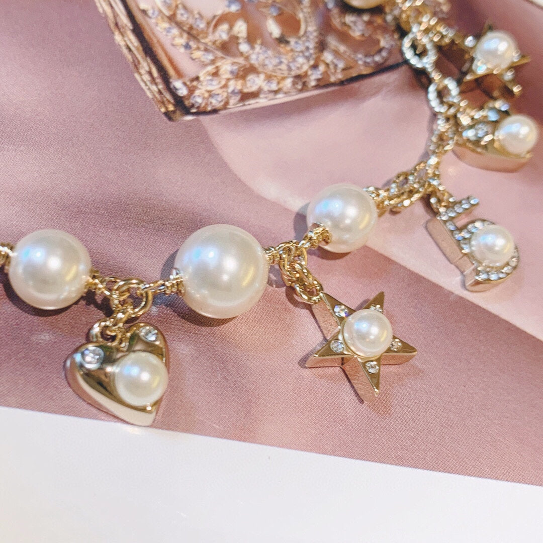 Martin Graham pendant necklace in polished metal-tone – styled product view