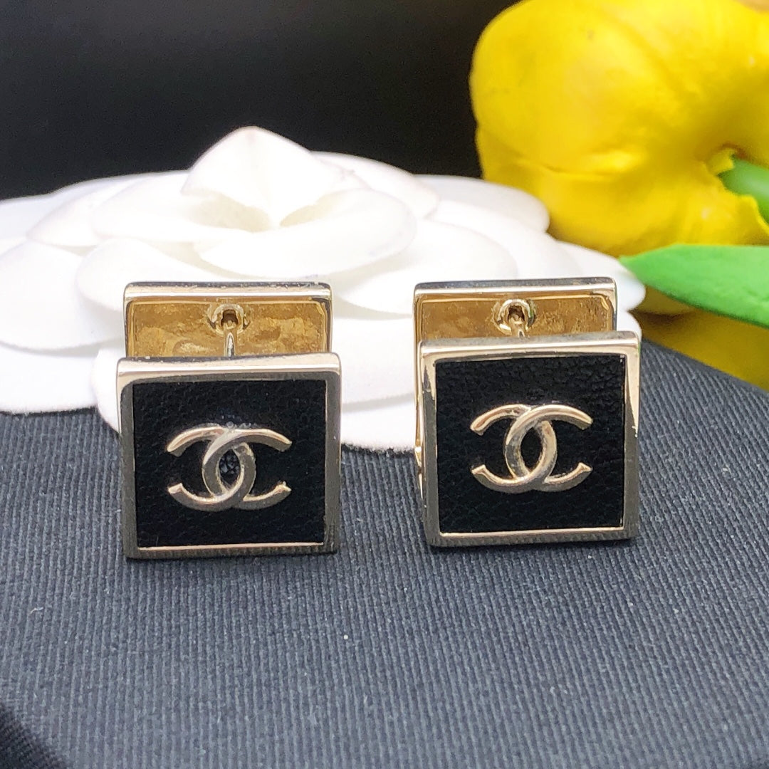 Martin Graham stud earrings in polished metal-tone – main product view