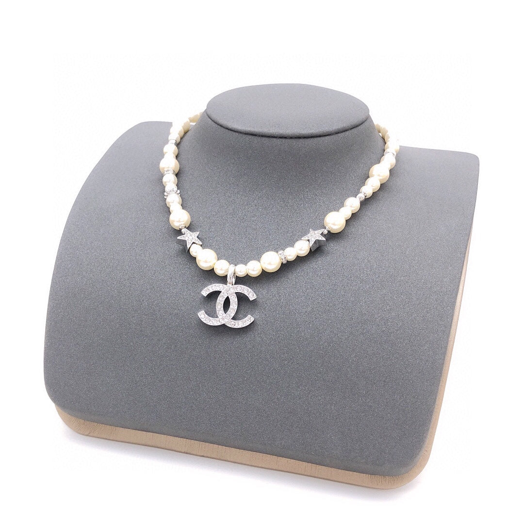 Martin Graham pendant necklace in polished metal-tone – styled product view