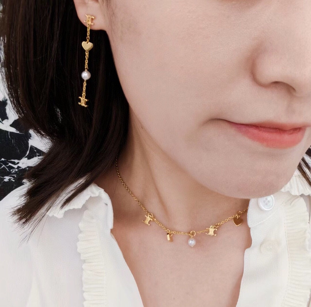 Martin Graham earrings in polished metal-tone – front view